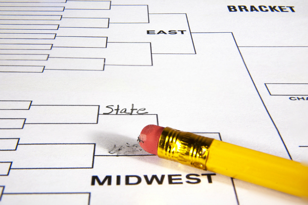 Tournament playoff bracket with one line filled in and one being erased